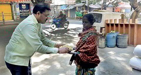 Shivakumar collects excess food from events and distributes it to the needy I Sridevi S