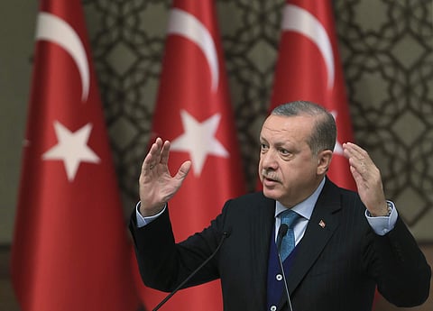 Turkey's President Recep Tayyip Erdogan, gestures as he delivers a speech at an event in Ankara, Turkey, Tuesday, Dec. 12, 2017. (Associated Press)