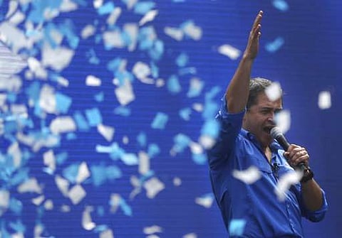 Honduran President Juan Orlando Hernandez speaks during his closing campaign rally, in Tegucigalpa, Honduras. | AP