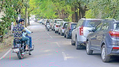 Parking of vehicles on roadside is a major contributor to traffic snarls in the city | Pushkar V