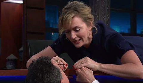 Kate Winslet and Stephen Colbert reenacts Titanic. | YouTube/The Late Show with Stephen Colbert