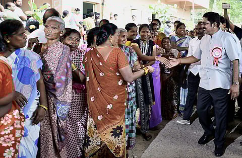 Sidelined AIADMK leader TTV Dhinakaran who is contesting as an independent candidate greeting voters at a polling booth during voting for the Dr Radhakrishnan Nagar Assembly constituency bypoll in Chennai on Thursday. (Photo | PTI)