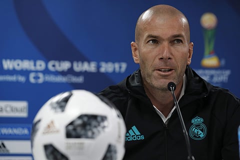 Real Madrid's head coach Zinedine Zidane speaks during a press conference at Zayed sport city in Abu Dhabi, United Arab Emirates, Friday, Dec. 15, 2017. | AP