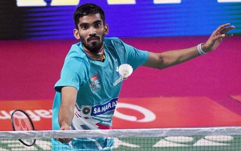 Awadhe Warriors player Kidambi Srikanth returns a shot of Chennai Smashers player Brice Leverdez Unseen during their Men's Single match. (PTI)