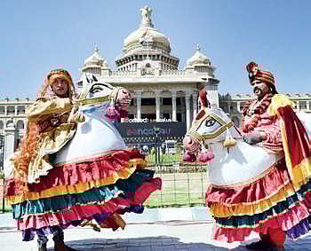 Folk artistes perform outside Vidhana Soudha on Sunday | jithendra m