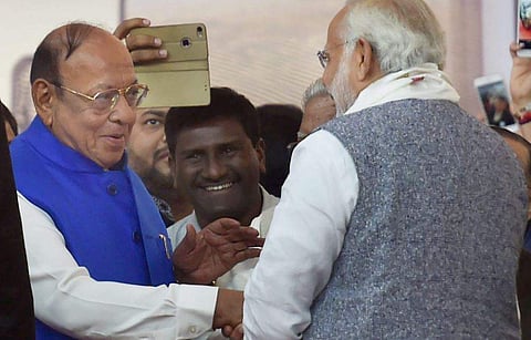 Prime Minister Narendra Modi meets former chief minister of Gujarat Shankarsinh Vaghela during the swearing-in ceremony of the new Gujarat government in Gandhinagar on Tuesday. | PTI