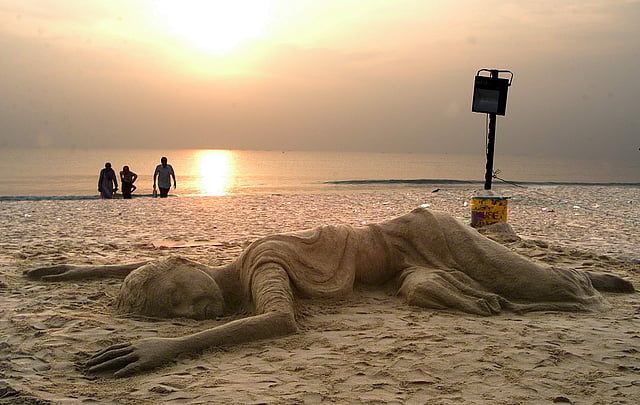 Fine Arts College students paid homage to tsunami victims by creating this sand sculpture at Marina in Chennai. (Express Photo | B A Raju)