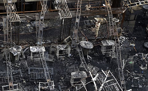 At least 14 people were killed and 23 injured after a major fire broke out in a building in Kamala Mills Compound in Lower Parel area of south Mumbai. (Photo | AP)
