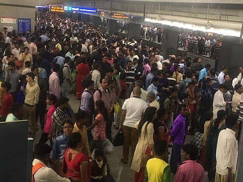 Metro passengers waiting at Rajiv Chowk metro station.  (ANI)