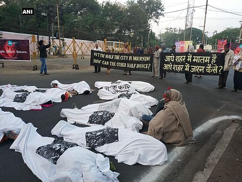 Bhopal gas tragedy victims demonstrate near Raj Bhavan in protest against 'Run Bhopal Run' marathon for being held on the anniversary of the gas tragedy. (ANI)