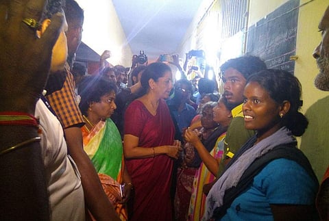 Defence Minister Nirmala Sitharaman interacting with locals at Thirupathysaram, Kanyakumari. (Photo | Twitter)