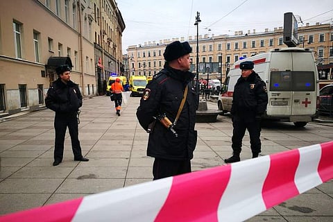 Police officers guard the area at the entrance to Technological Institute metro station in Saint Petersburg on April 3, 2017. | AFP