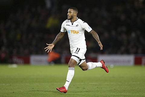 Swansea City's Luciano Narsingh celebrates scoring his side's second goal against Watford | AP
