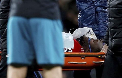 Romelu Lukaku being carried off after the collision | AP