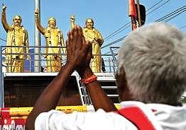An AIADMK cadre seen worshiping the statue unveiled during the event in Coimbatore on Sunday | A RAJA CHIDAMBARAM
