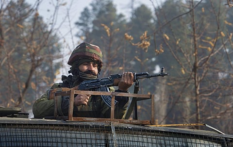 Representational image. Security personnel leaving after an encounter with the militants at Futlipora Pakharpora in Budgam district of central Kashmir on Thursday. Four militants were killed in the encounter. (File | PTI)