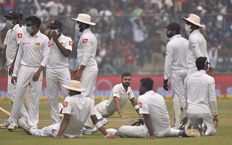 Indian skipper Virat Kohli's sixth double century as captain was overshadowed on the second day after Sri Lanka complained about air pollution, halting play three times. | PTI