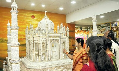 Visitors look at structures made of seashells and conchs at Kalashree museum in Mysuru on Sunday | Udayashankar S