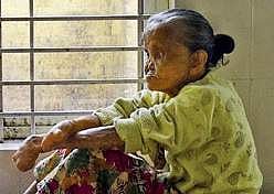 Sajidha, who lost her fingers and eyesight, was informed that her pension of Rs 1,000 per month would stop if she failed to link it with her Aadhaar, for which fingerprint and iris scan are a must. (Express Photo)