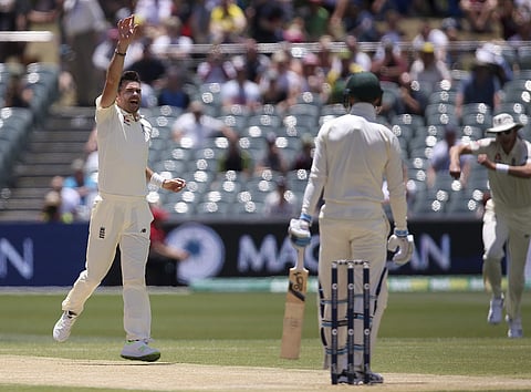 England's James Anderson, left, celebrates while believing he has taken the wicket of Australia's Peter Handscomb only to have it overturned by review during the fourth day of their Ashes Test match in Adelaide, Tuesday, Dec. 5, 2017. | AP