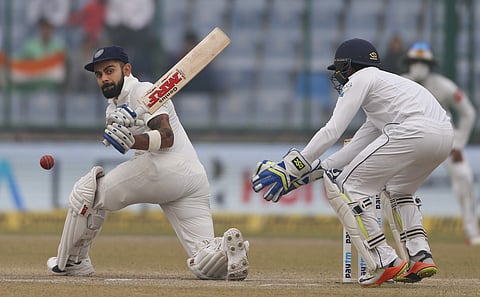 India's captain Virat Kohli plays a shot during the fourth day of the Test against Sri Lanka | AP