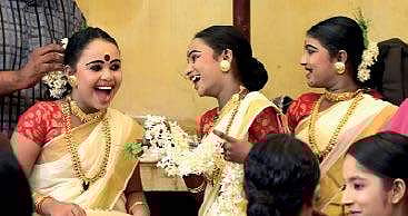 Thiruvathira contestants in the UP category get their hair done for the competition