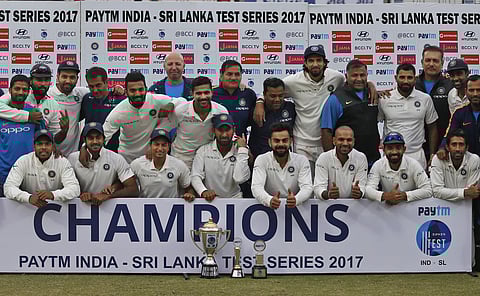 India team members pose with the trophy | AP