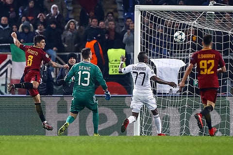 Roma's Diego Perotti, left, scores his side's first goal during the group C Champions League soccer match between Roma and Qarabag at the Stadio Olimpico in Rome, Italy, Tuesday, Dec. 5, 2017. | AP