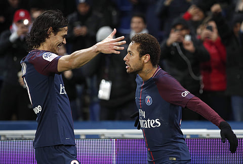PSG's star strikers Edinson Cavani (L), and Neymar | AP
