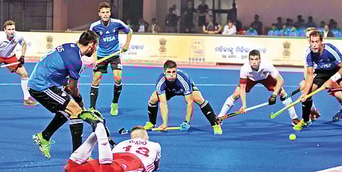 Action from the match between Argentina and England at Kalinga Stadium in Bhubaneswar on Thursday (EPS | Shamim Qureshy)