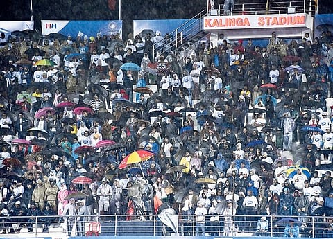 A section of crowd with umbrellas at Kalinga Stadium, Bhubaneswar during India-Argentina semi-final match on Friday | Express