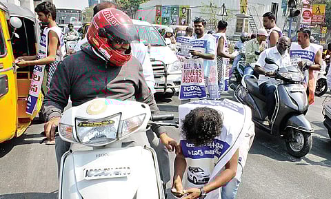 Members of TCDOA begging on the street at Jubilee Hills checkpost crossing in Hyderabad on Friday | Sayantan Ghosh