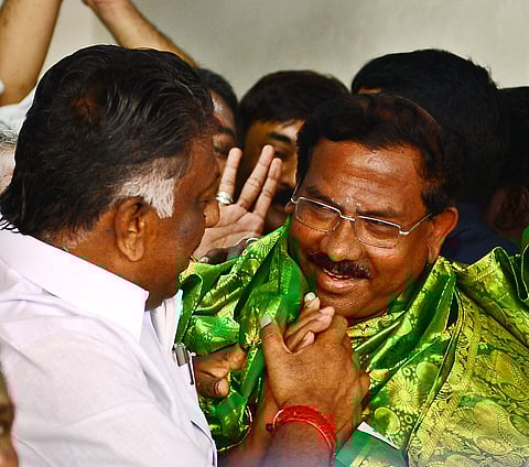 School education minister 'Ma Foi' K Pandiarajan joins O Panneerselvam at his residence in Chennai on Saturday. (Martin Louis | EPS)