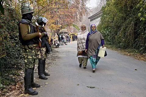Two soldiers guard the roadway to Sri Pratap College Srinagar in Kashmir valley. | PTI File Photo