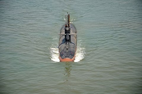 In this handout photograph released by The Indian Navy on May 1, 2016, India's Scorpene Class Submarine 'Kalivari' takes part in its maiden sea trials off the coast of Mumbai on May 1, 2016. | AFP