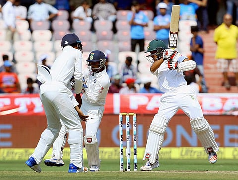 Mehedi Hasan of Bangladesh in action during the third day of the cricket test match against India in Hyderabad on Saturday. | PTI