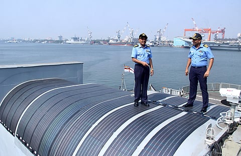 INS Sarvekshak commanding officer Captain Rajesh Bargoti and electrical officer commander Sreejith Thampi on the helo deck canopy, where solar panels are fitted | Melton Antony