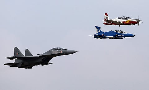Indian Air Force aircrafts perform aerobatic flight at the opening ceremony of Aero India 2017 at Yelahanka air base in Bangalore, India, Tuesday, Feb. 14, 2017. | AP