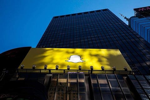A billboard displays the logo of Snapchat above Times Square in New York March 12, 2015. (File Photo | Reuters)