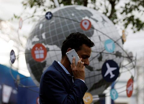 A delegate speaks on the phone as he attends the National Association of Software and Services Companies (NASSCOM) India Leadership Forum in Mumbai, India February 16, 2017. (Photo | Reuters)