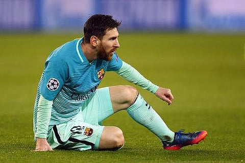 Barcelona's Lionel Messi looks on during the Champion's League round of 16, first leg soccer match between Paris Saint Germain and Barcelona. | AP