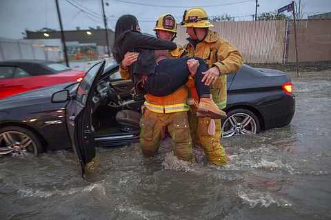After years of severe drought, a storm brought torrential rain to California on February 17, bringing alive the 1971 song, 'It never rains in southern California' by Albert Hammond. Firefighters had to rescue stranded people from flooded streets as heavy 