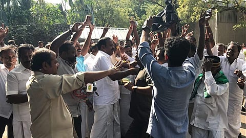 Cadres who were eagerly awaiting the floor test results, celebrate after Palanisamy proves majority. | EPS