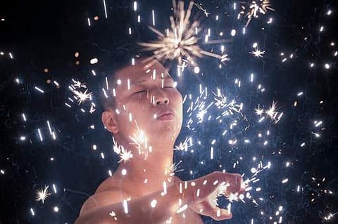 A villager performing the 'eating flowers' ritual in Fangshan village in China's coastal province of Fujians. | AFP