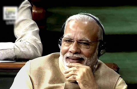 A satisfied Prime Minister Narendra Modi was all smiling during the session which announced that his “demon” (demonetisation) move would help transfer money from the pockets of tax evaders to the government. | PTI