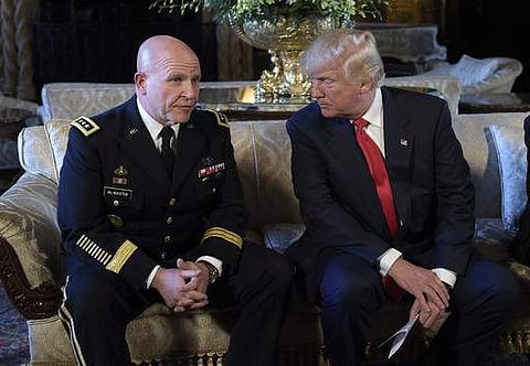 President Donald Trump, right, listens as Army Lt. Gen. H.R. McMaster, left, talks at Trump's Mar-a-Lago estate in Palm Beach | AP