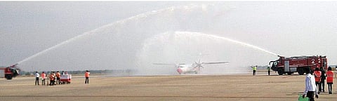 Airport Authority of India officials giving a water salute to the new kid on the block at the Tiruchy International Airport on Monday | Express
