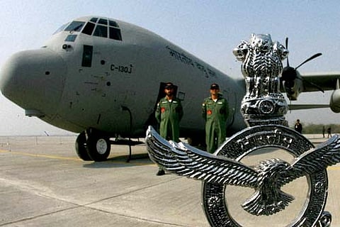 In this File photo Indian Air Force personnel stand near C-130J-30 Super Hercules aircraft after its induction ceremony at Hindon Air Force Station in Uttar Pradesh. | PTI