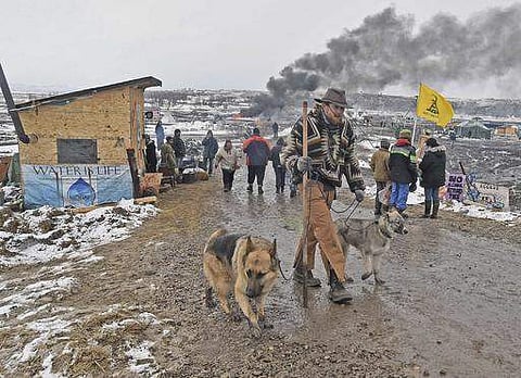 Opponents of the Dakota Access pipeline leave their main protest camp on Wednesday. (Photo | AP)