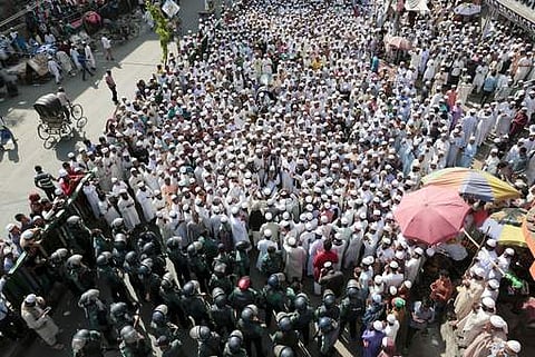 Supporters and sympathizers of the hardline Hefazat-e-Islam participate in a protest rally demanding a Lady Justice statue be removed from the Supreme Court complex in Dhaka. (Photo | AP)